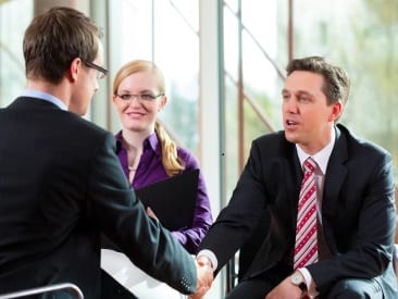 Man having an interview with manager and partner employment job